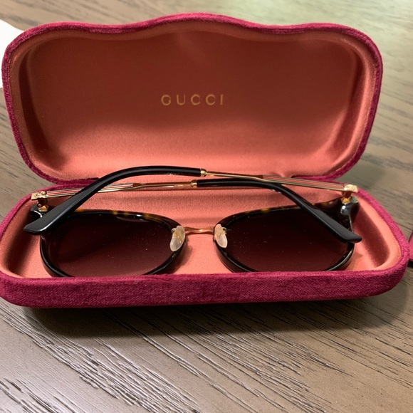 Gucci sunglasses.